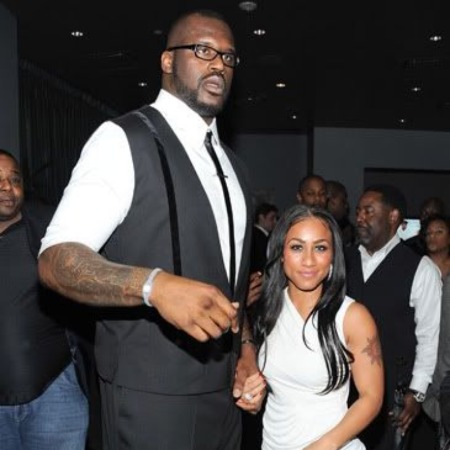 Shaquille O'Neal with his girlfriend Nicole Alexander.